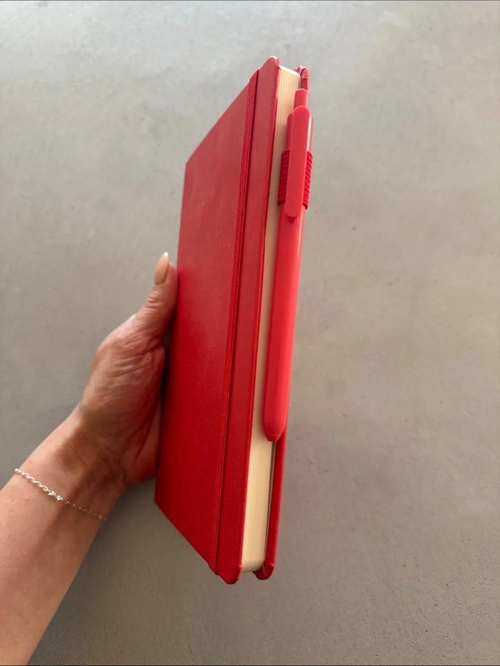 NWOT FEELA CORAL/RED HARDBACK NOTEBOOK WITH PEN